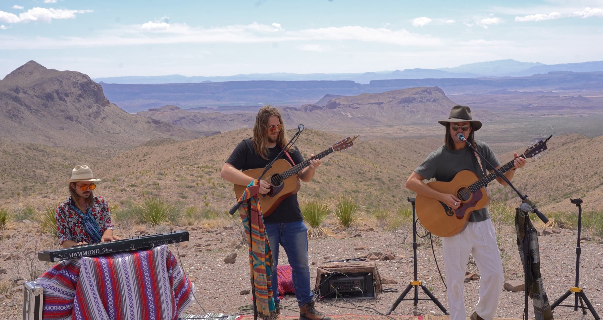 Benjo and The Fonts performing with Santa Elena Canyon behind them